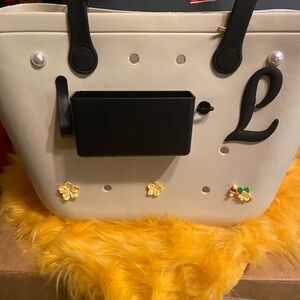 Brand new beach 💋💋💋  SOLD 💋💋💋💋 bag the color is cream with the black handles